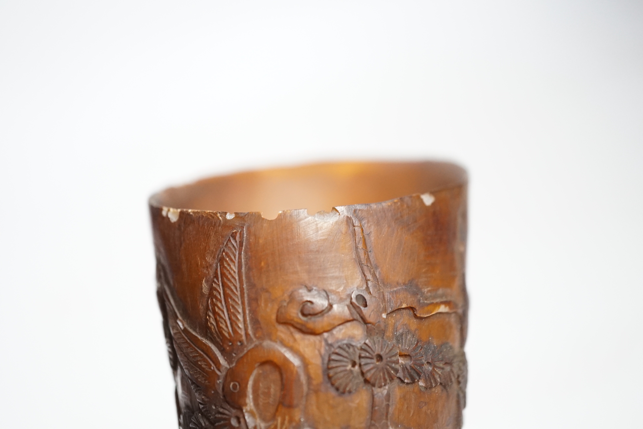 A Chinese carved horn cup 13cm